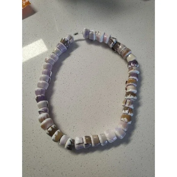 Spiral Puka Shell Necklace 23 inch length with 3/4 wide multi-color shells